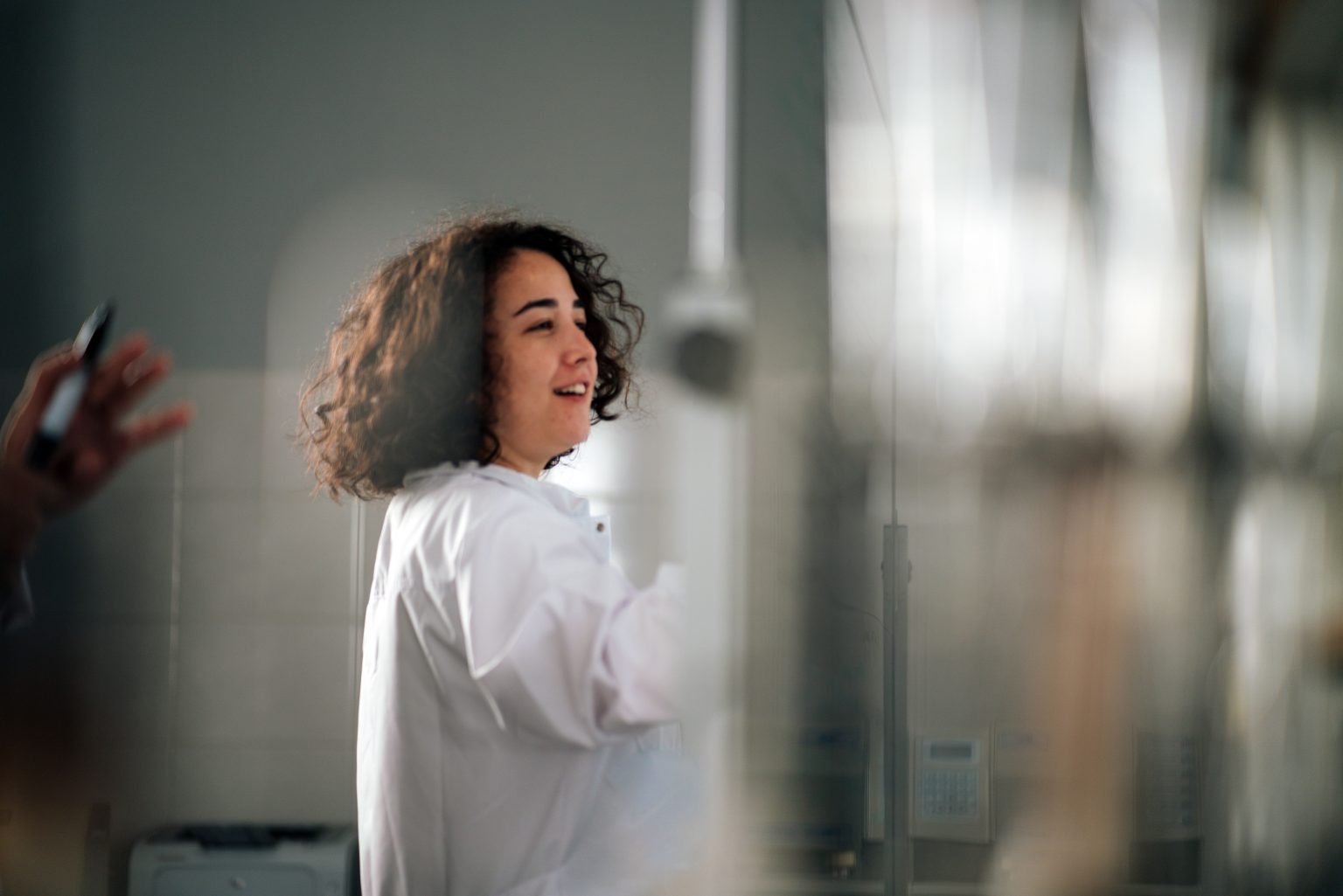 Person in a white laboratory coat